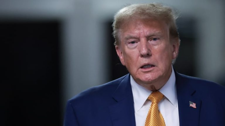 former-u-s-president-donald-trump-walks-to-speak-with-members-of-the-press-in-new-york
