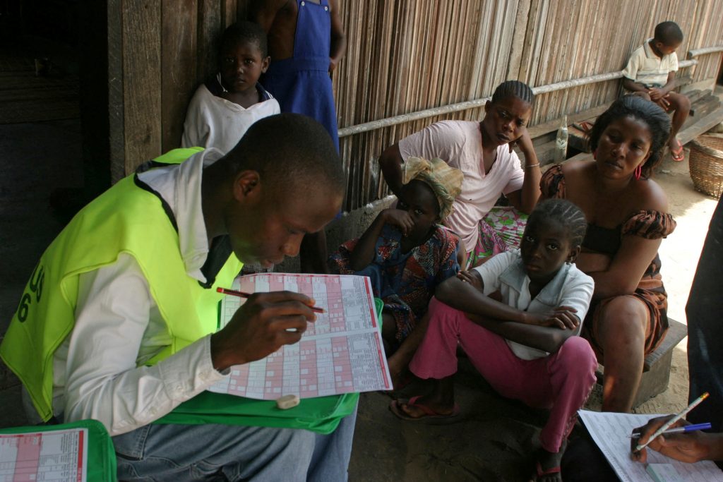 FILE PHOTO: People wait to be counted  on Ibeshe island,in Nigeria's last census
