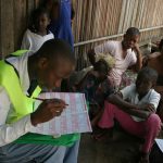 FILE PHOTO: People wait to be counted  on Ibeshe island,in Nigeria's last census