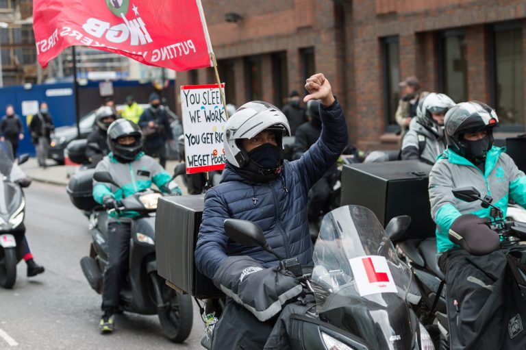 2021-04-07T000000Z_950300187_MT1NURPHO0002E5WL6_RTRMADP_3_DELIVEROO-RIDERS-STRIKE-IN-LONDON-scaled