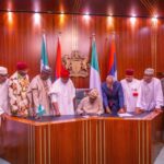 Tinubu-signs-electoral-act2-1044x737