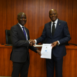 Dr Aminu Maida, Executive Vice Chairman/CEO, Nigerian Communications Commission, NCC; and Mr. Olayemi Cardoso, Governor, Central Bank of Nigeria, during the signing Memorandum of Understanding between NCC and CBN, 20th of April 2026, at the CBN"s Headquarters Abuja.